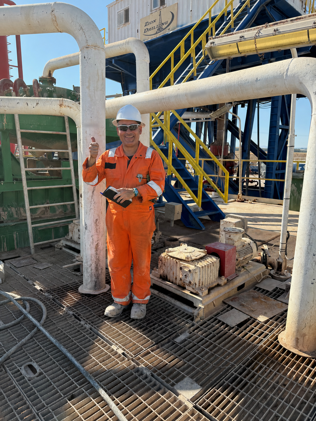 Smiling MJ-02 crew member at the drilling site