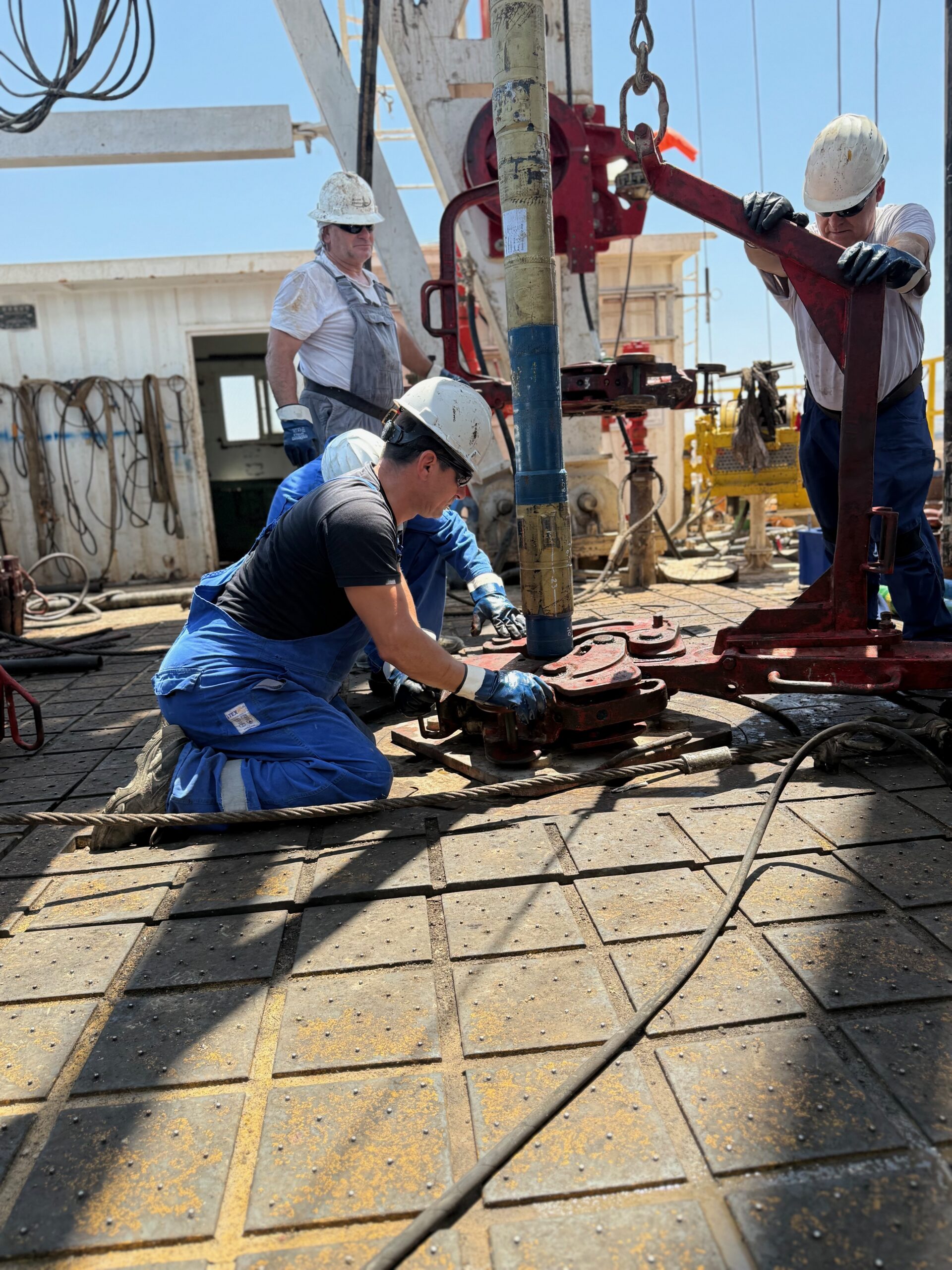 MJ-02 crew at work on site equipment