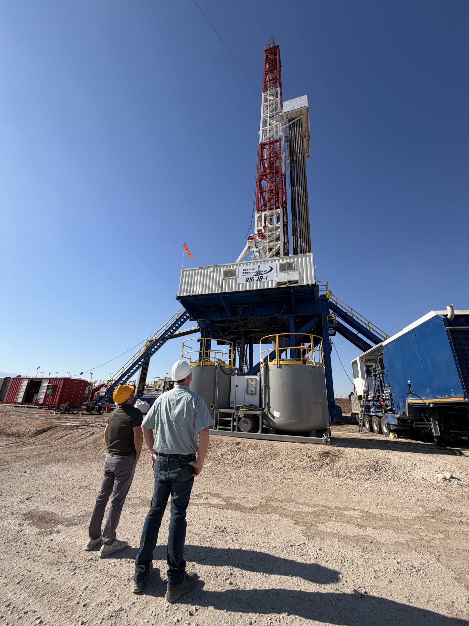 Rob Dunn and Monty Kness viewing the MJ-02 drilling rig
